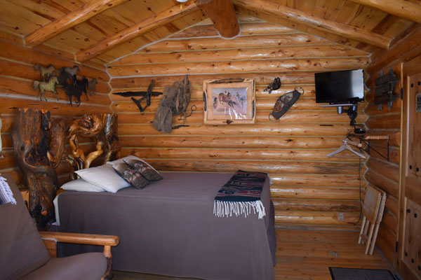 The Bronc Buster Log Cabin